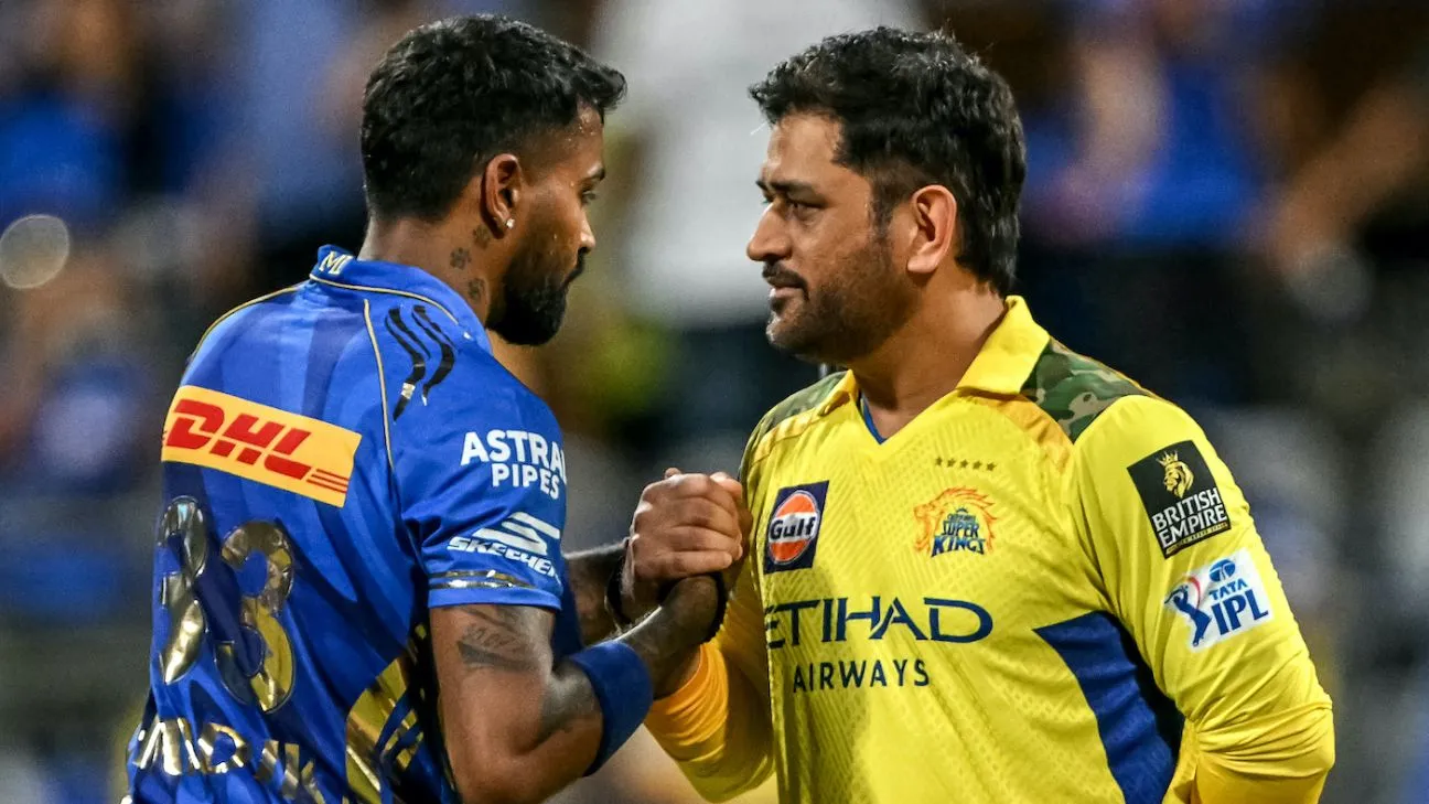 IPL cricket match in progress at stadium with floodlights